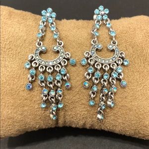 Beautiful dangling earrings with blue stones